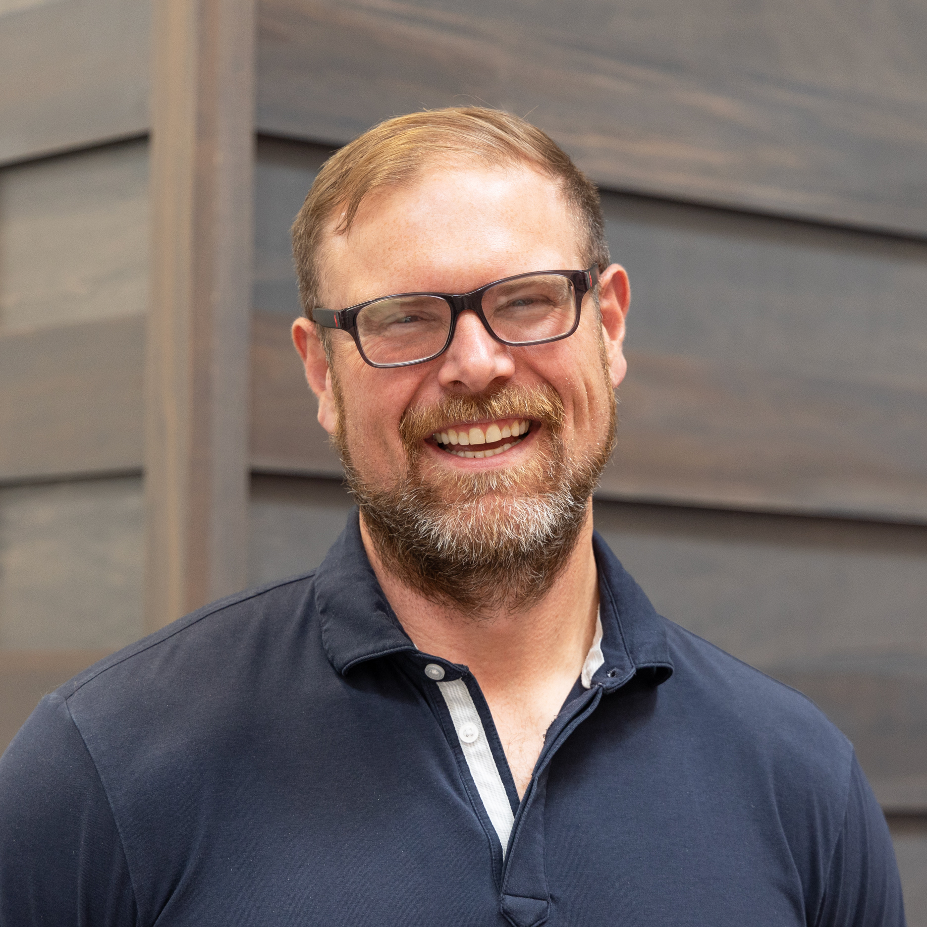 Man in Glasses Smiling