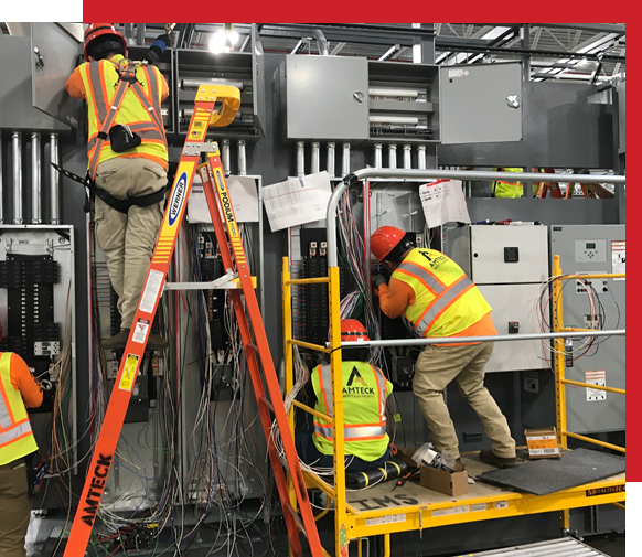 electricians working on a modular cooling installation