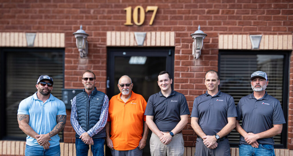 men in front of office